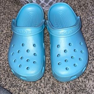 Light blue crocs.